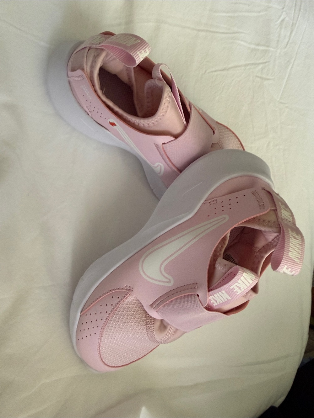 Nike Kids Pink Slip-On Sneakers with White Swoosh